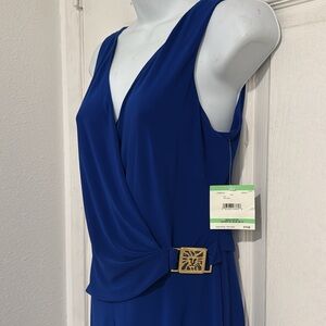 NWT Royal blue jumpsuit stretchy material is perfect for special occasion.size 6